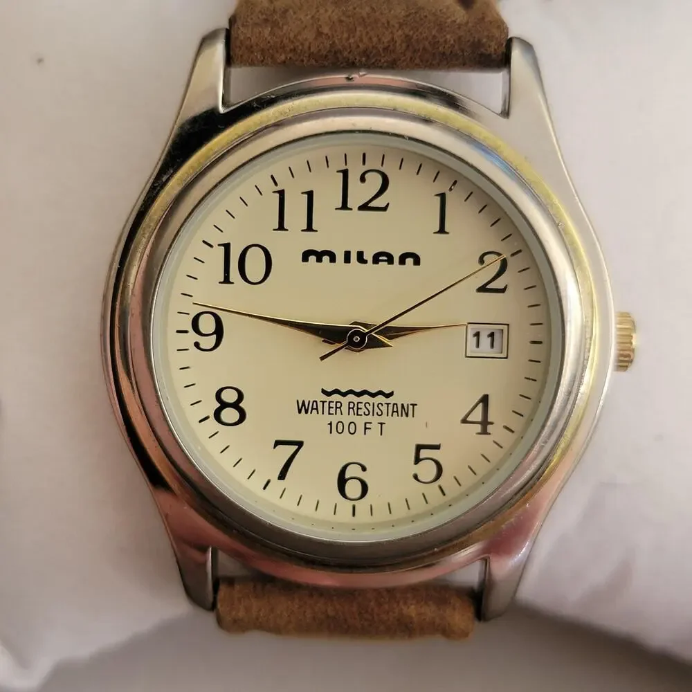 Vintage Milan MLN787 Mens Watch Silver Case Cream Dial Brown Leather Quartz